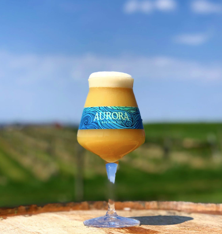 Cup of crafted beer from Aurora Brewing