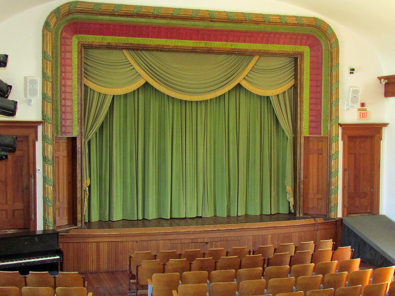 Stage with seats at Morgan Opera House.