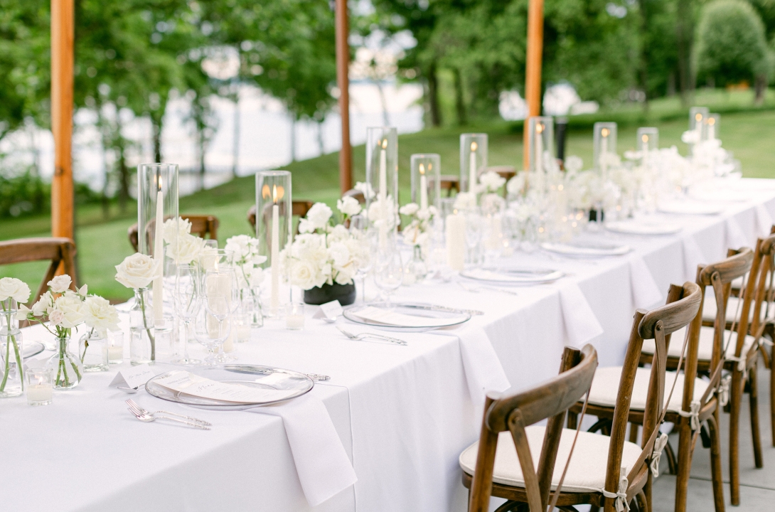 White table wedding reception set up with chairs