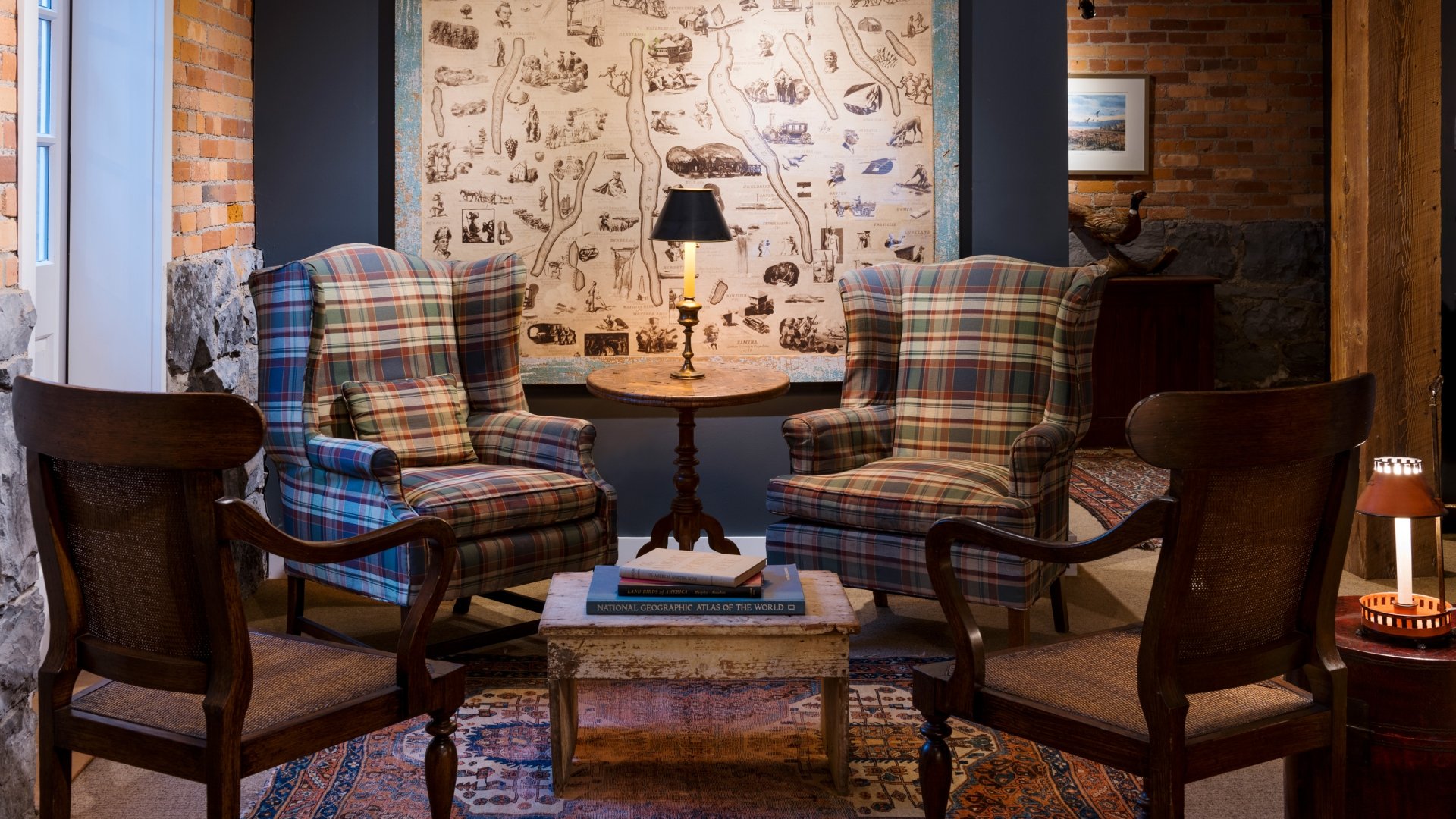 A moody room with a chair and table.