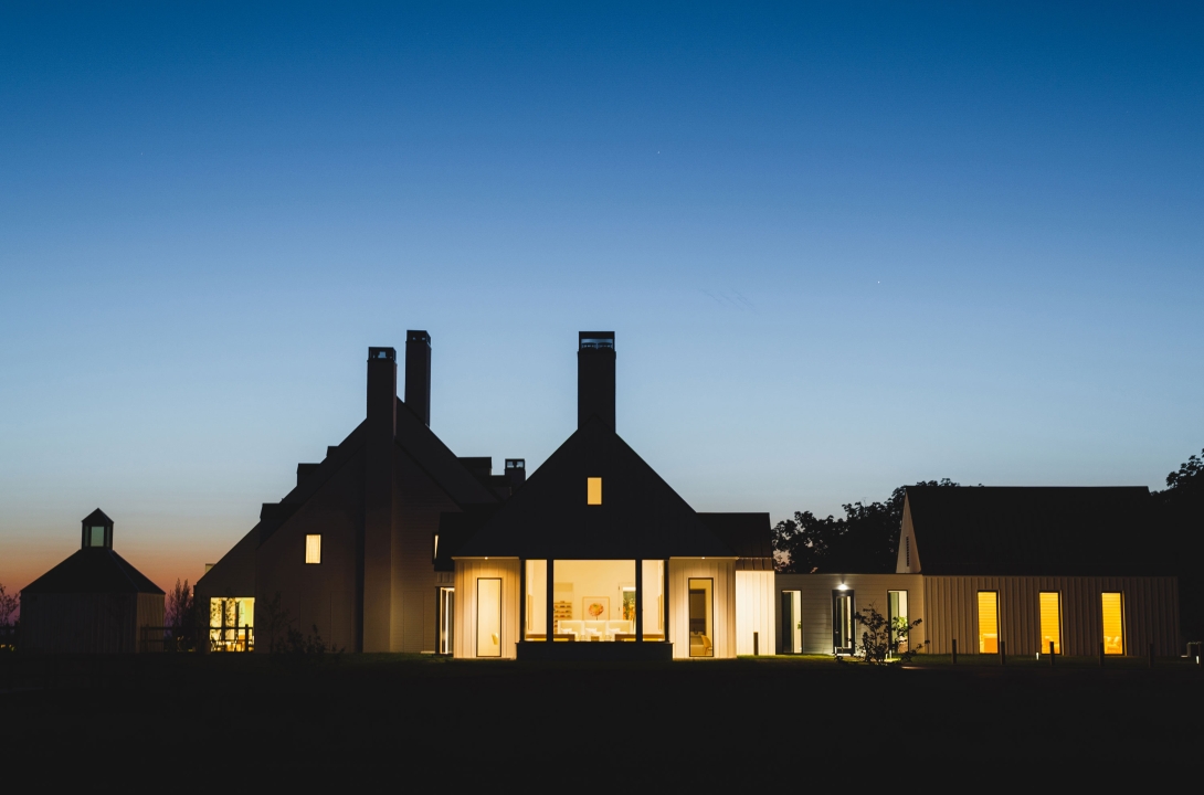 Evening perspective of the south facade of the Inns of Aurora bulding.