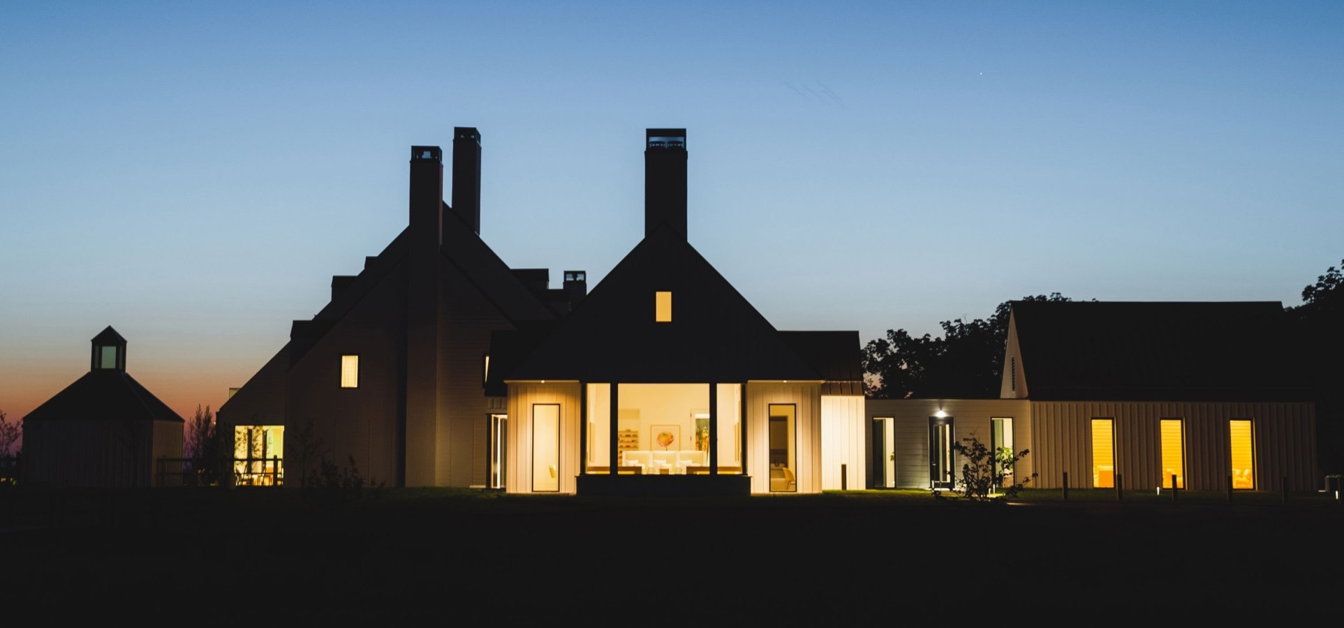 Evening perspective of the south facade of the Inns of Aurora bulding.