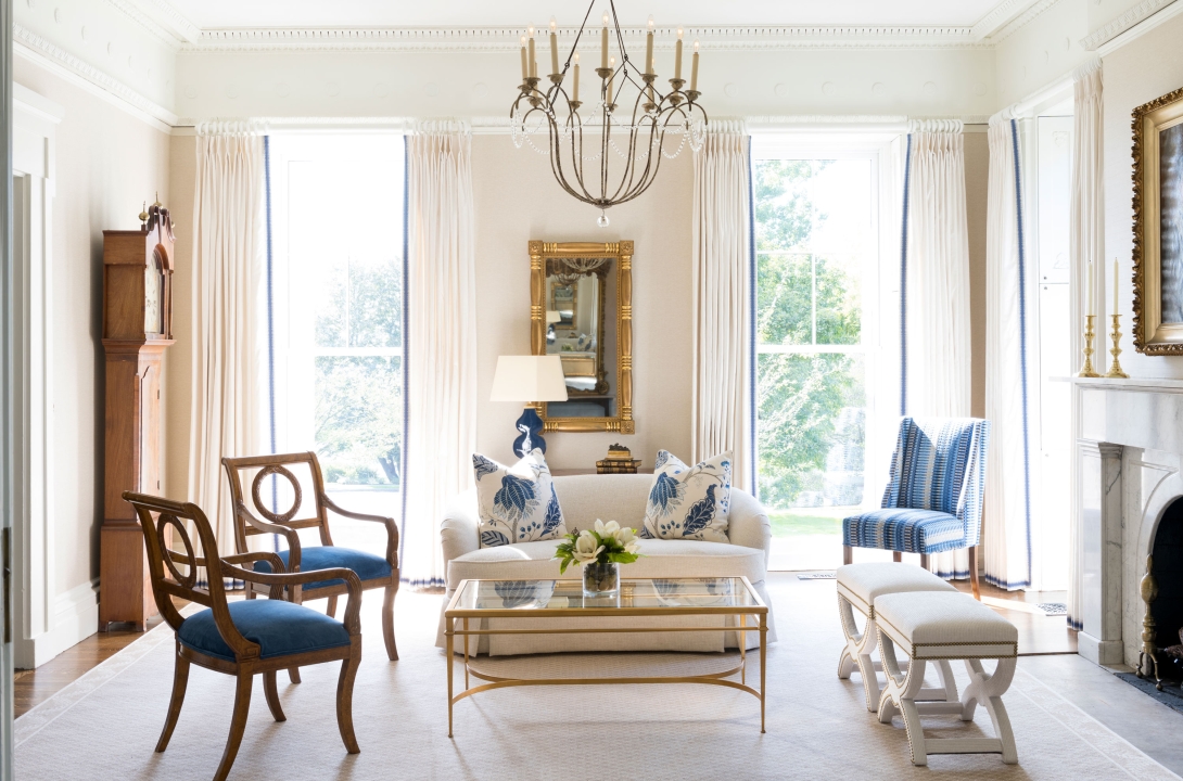 Taylor House West Parlor living room with blue and white furnishings.